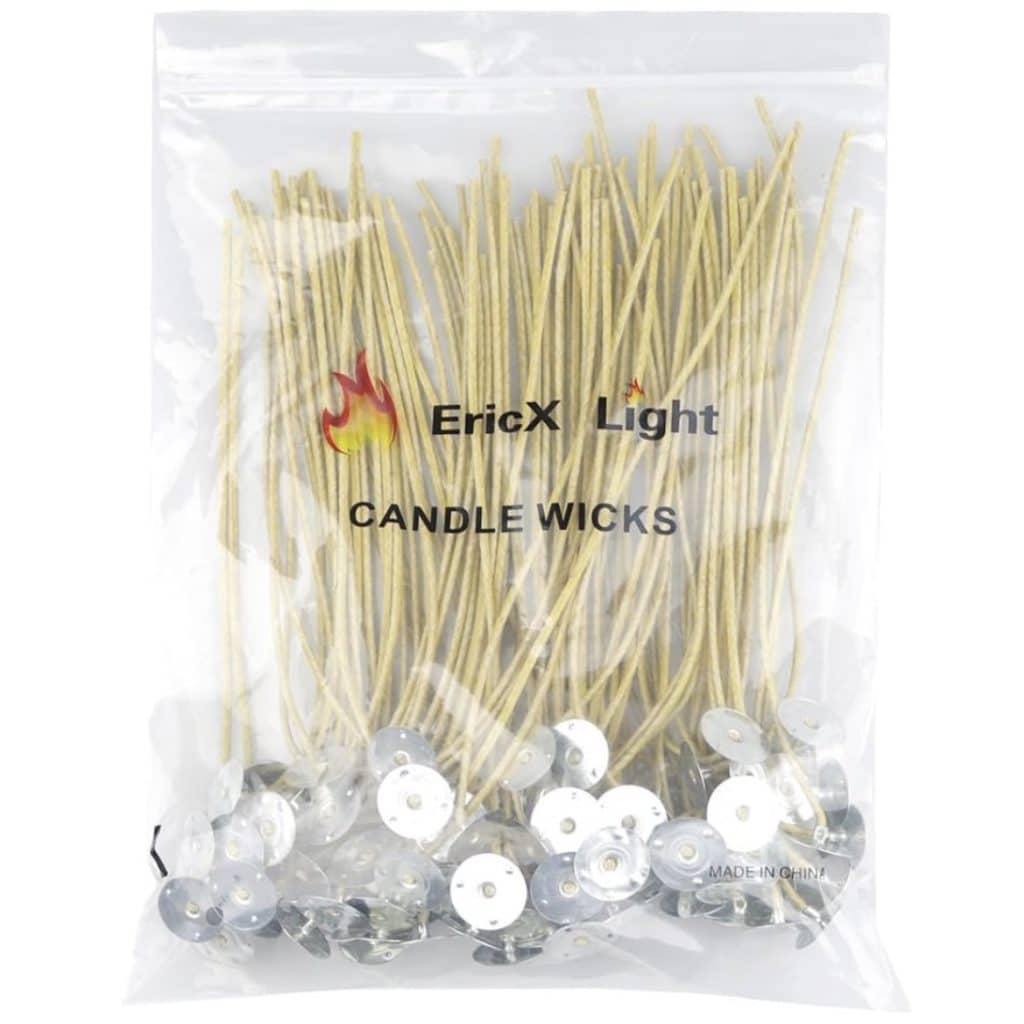 A clear plastic bag labeled "EricX Light Candle Wicks" contains a bundle of long, natural-colored candle wicks with metal bases, perfect for creating candles adorned with dried flowers. The label features a small flame icon and notes they are made in China.